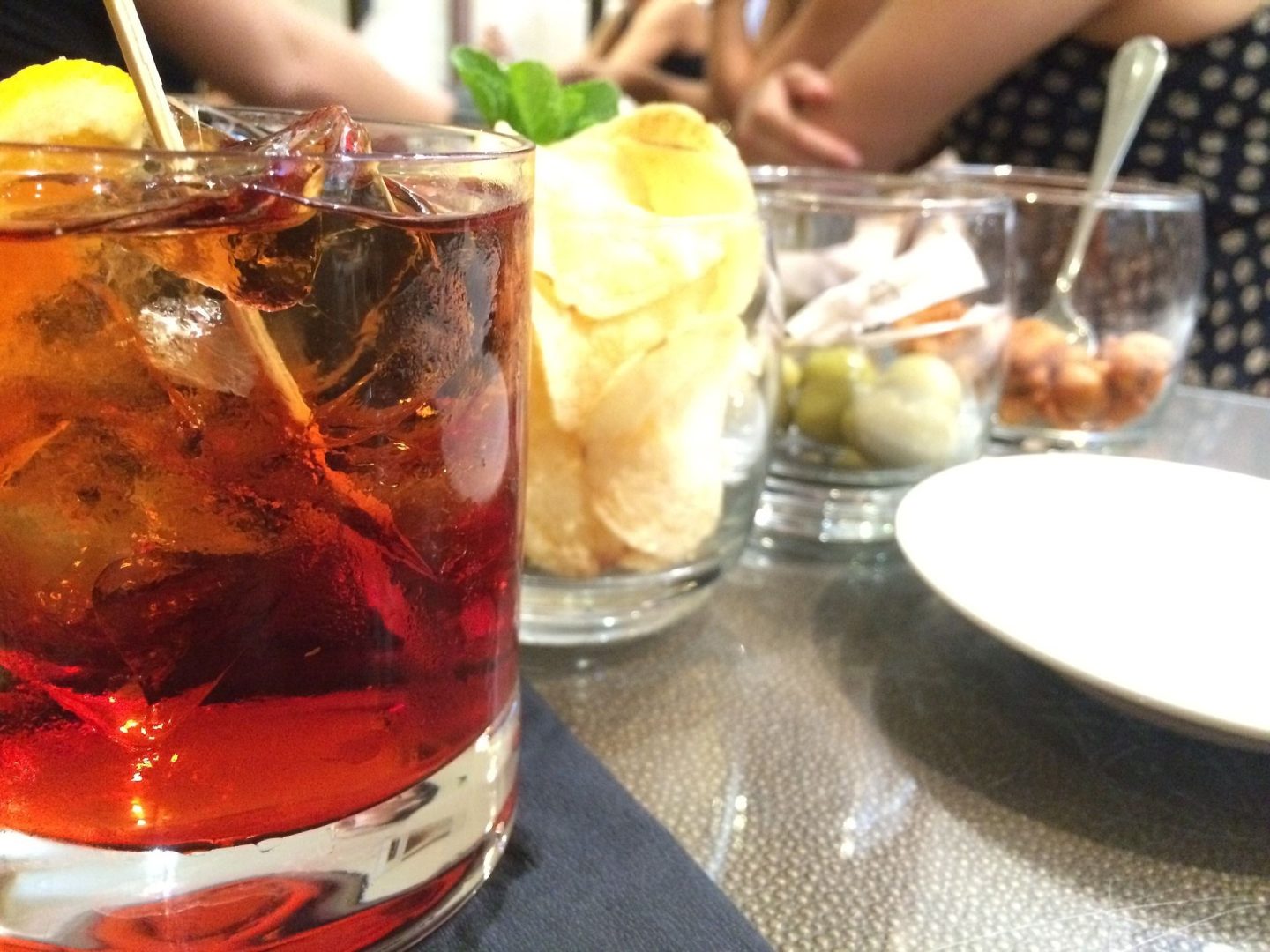 A glass of Negroni at aperitivo