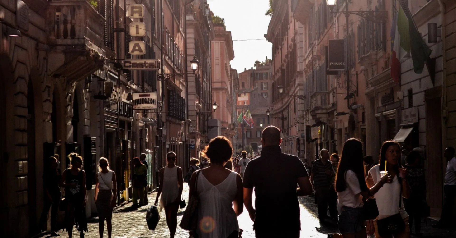 People enjoying a leisurely stroll in Naples