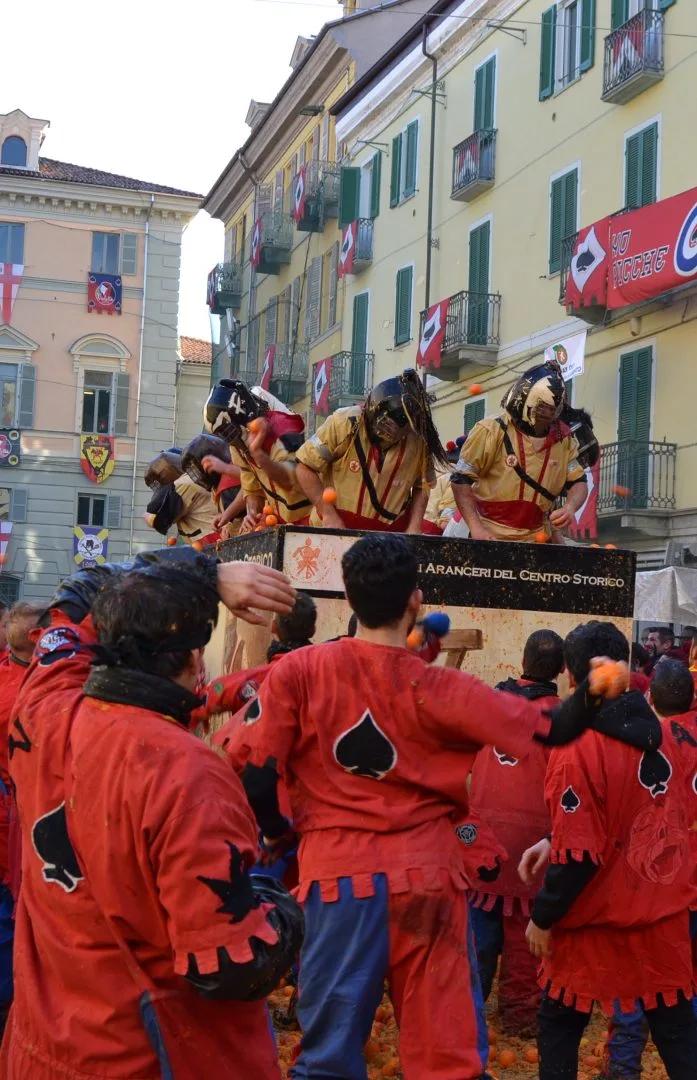 Orange throwers at the battle of the oranges in Ivrea, one of Italy's most spectacular Carnival celebrations