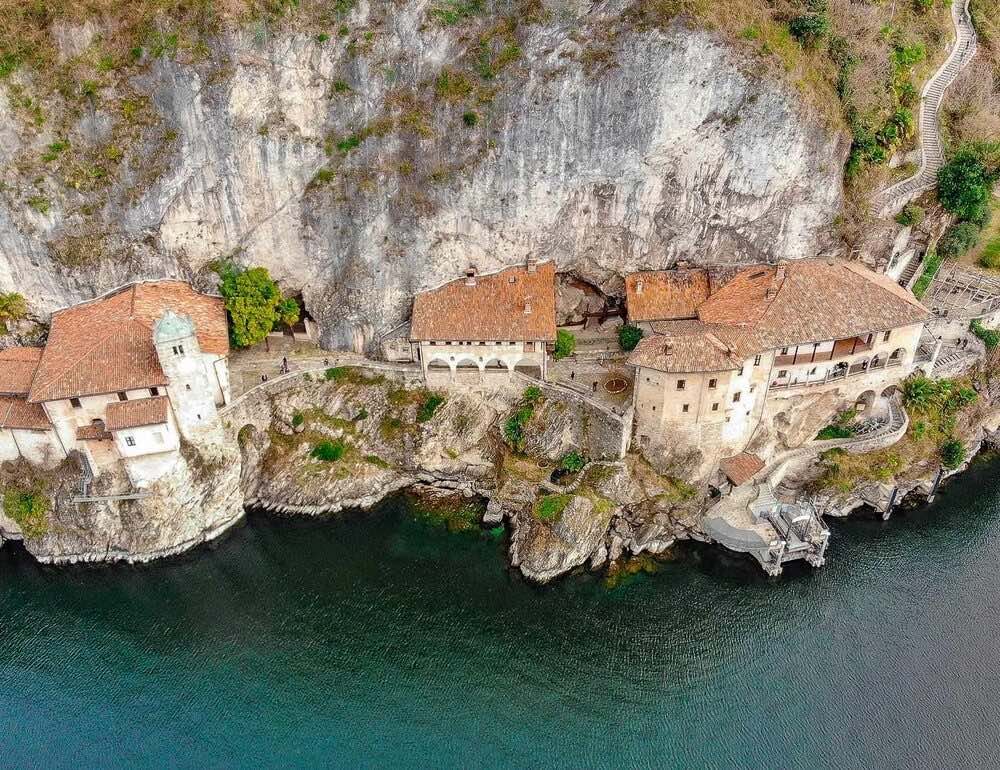 A monastery carved into the rock, as seen from above