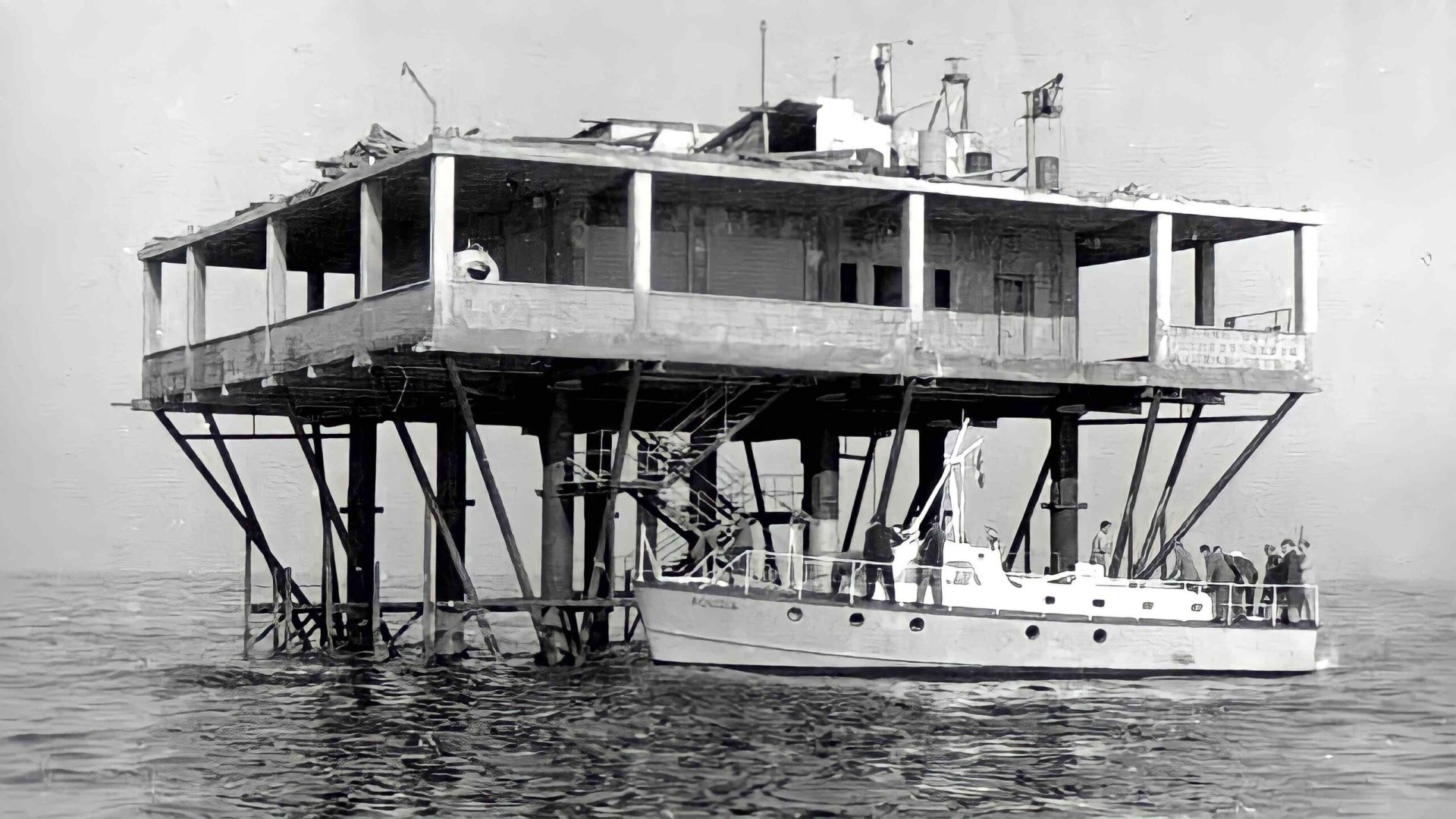 a platform of steel and concrete built right in the middle of the sea