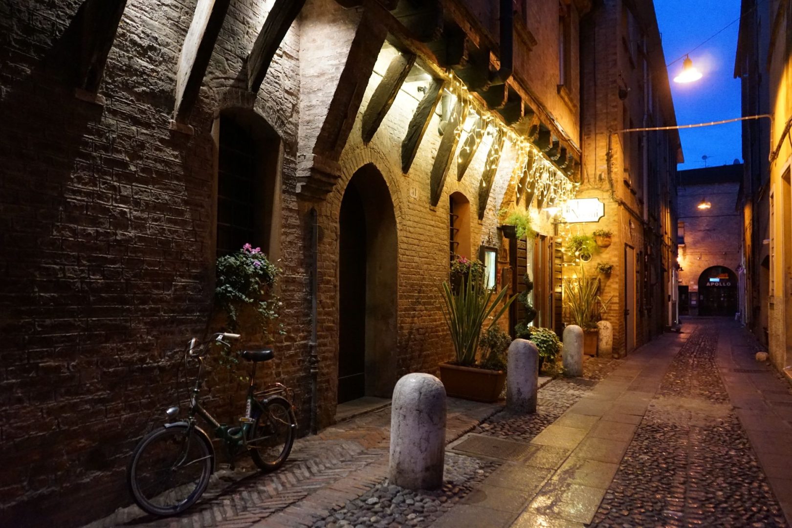 Ferrara medieval alley at night