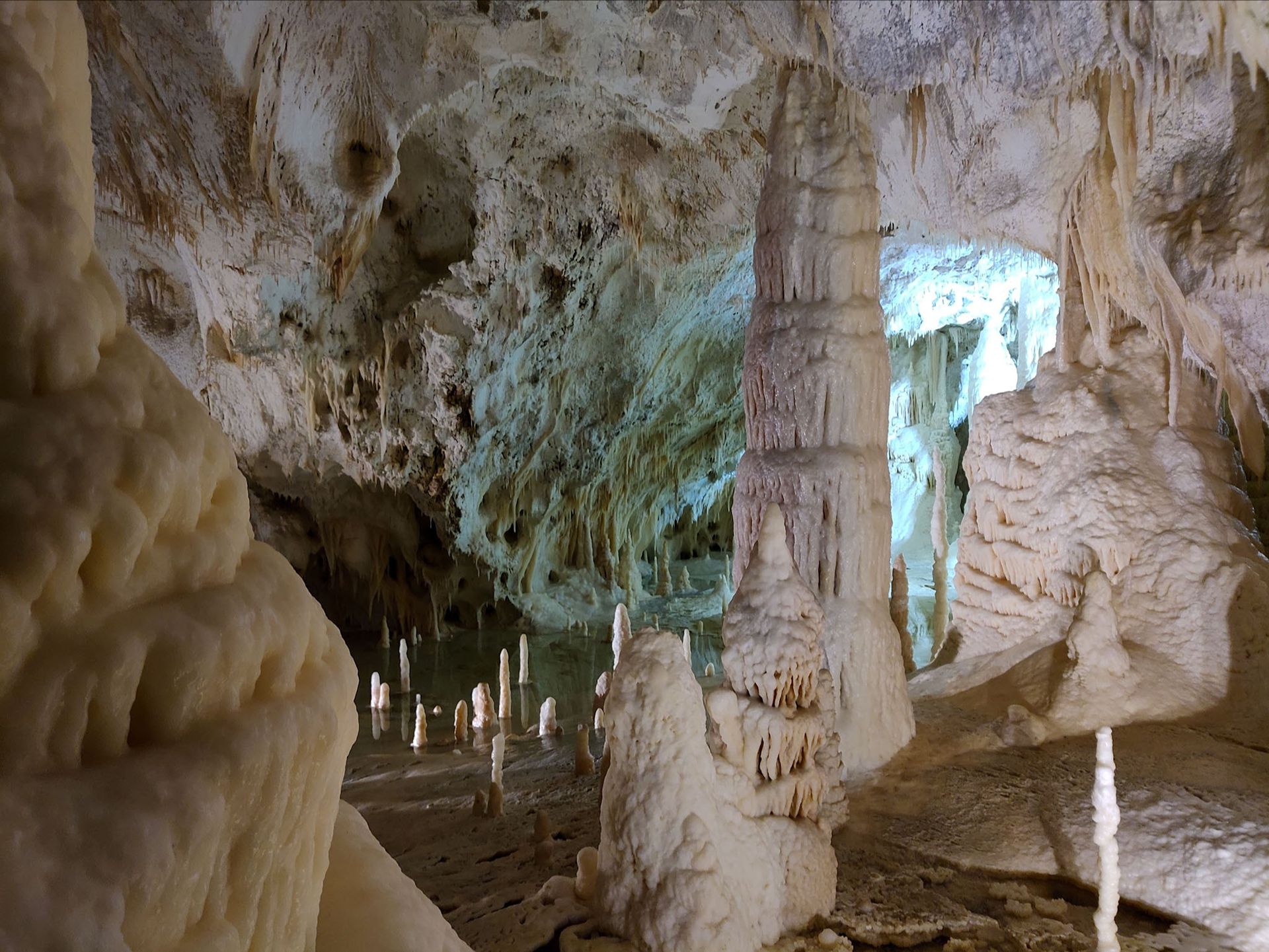 Sparkling white natural sculptures inside the Frasassi Caves in Le Marche region